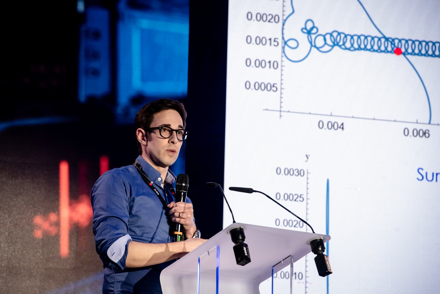 Joshua Rasera presenting at a conference