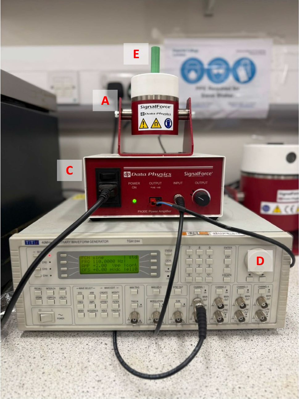 Vibration apparatus used to investigate Apollo regolith and simulants